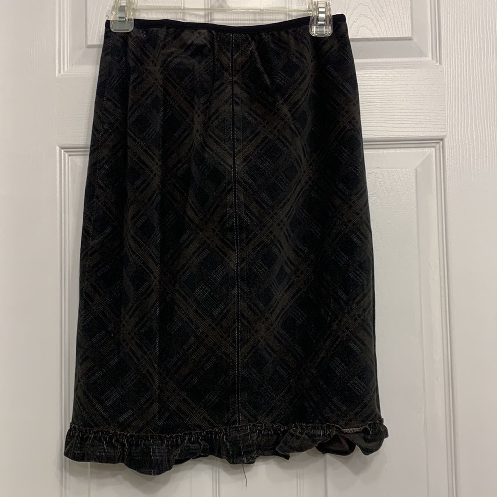 2/$10 Plaid corduroy skirt with thin elastic middle panel and ruffle hem